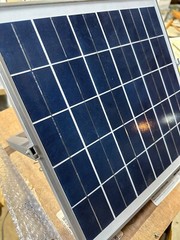 Solar Panel 15w 19v for hobby project or replacement part.  13.75″x13.75″